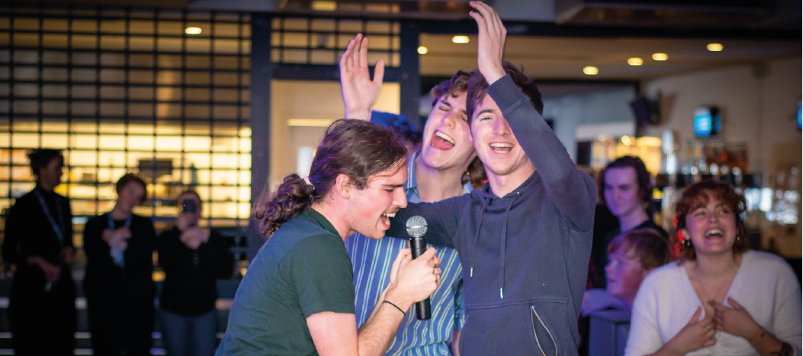 Photo of group of students singing at Ayr karaoke night