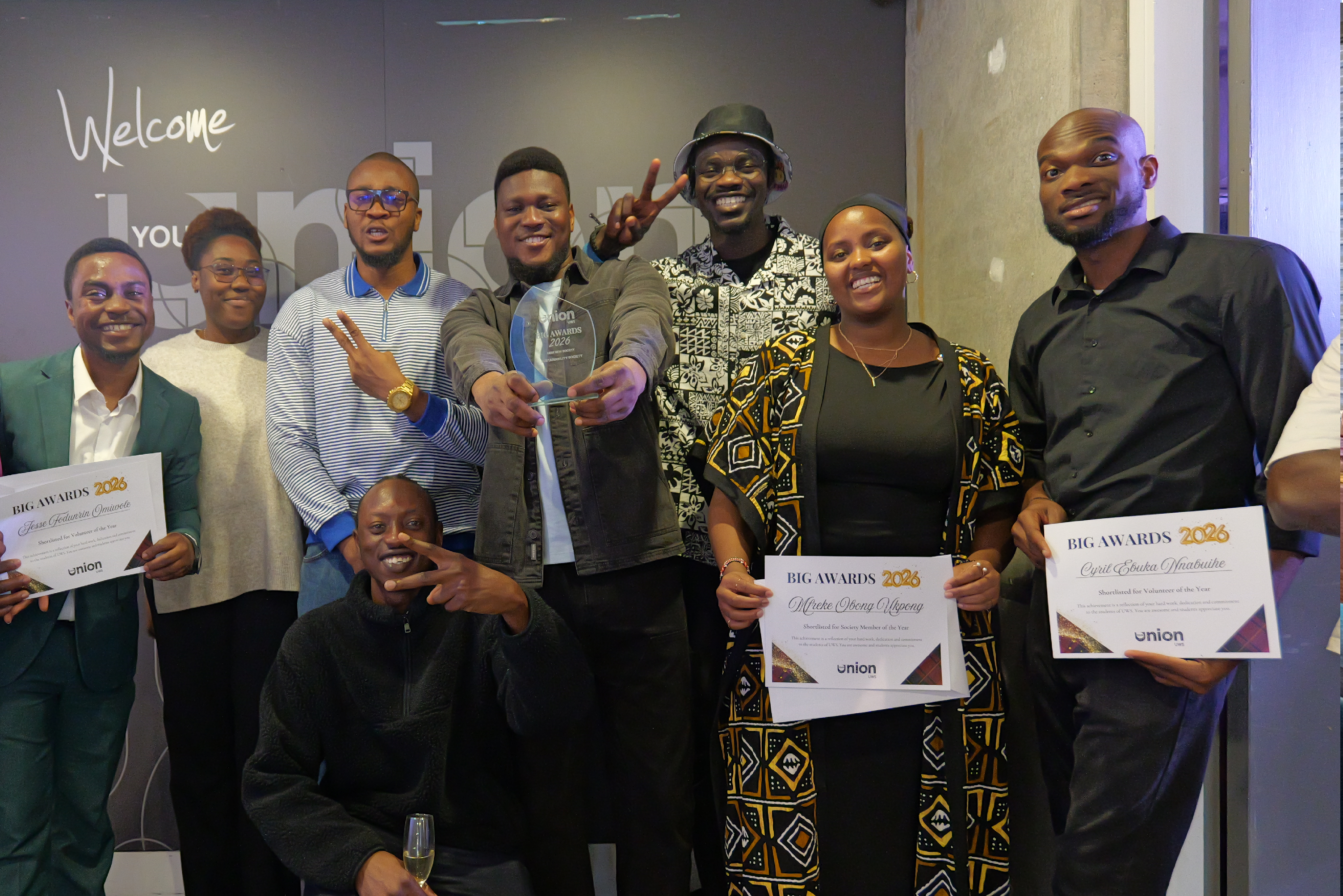 7 members of the UWS Sustainability Society smiling at the camera