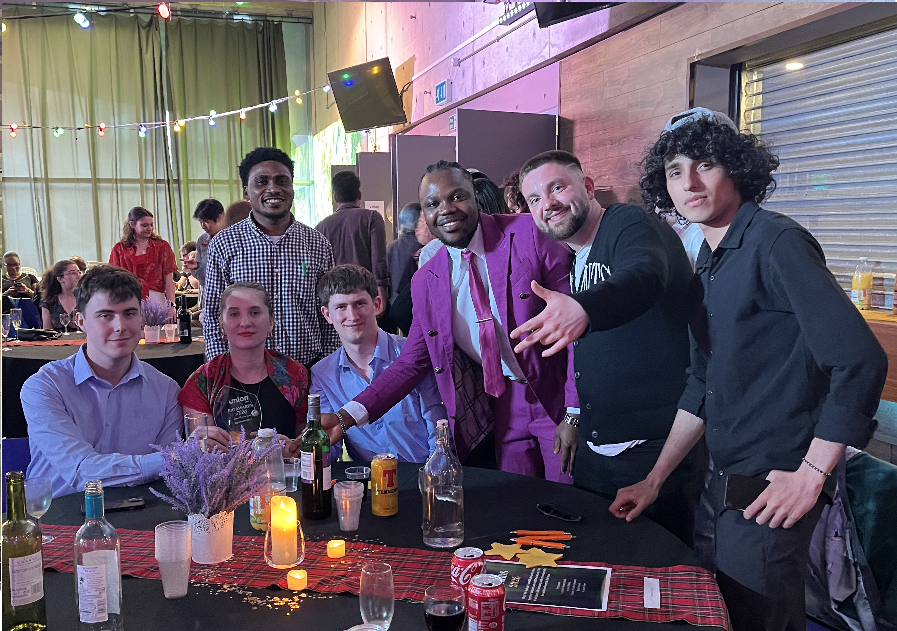 7 members of the UWS Debating Society smiling at the camera
